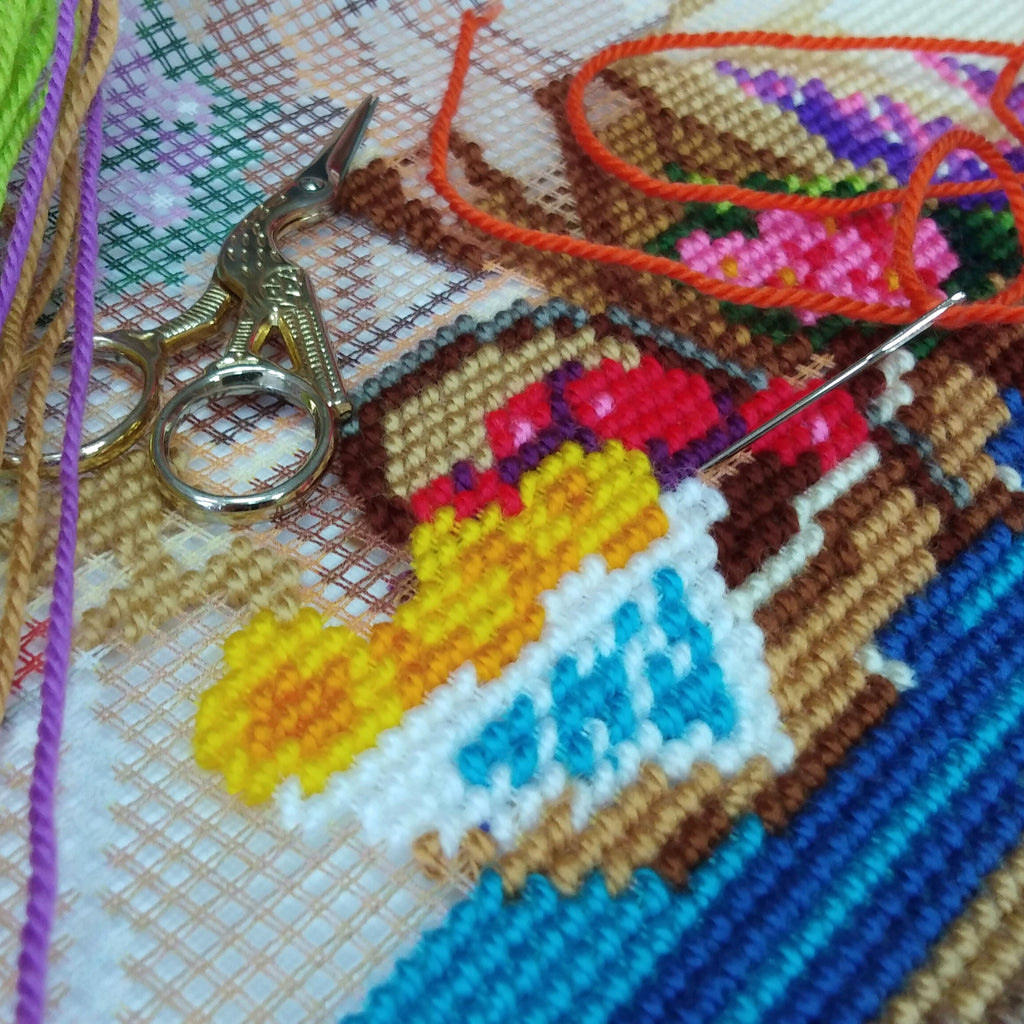 Watering Can at Backyard — Needlepoint Kit 16″ × 16″ by Brvsk